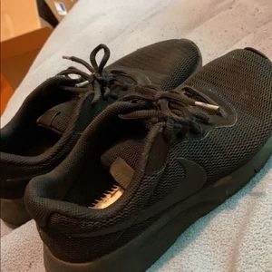Nike triple black running shoes